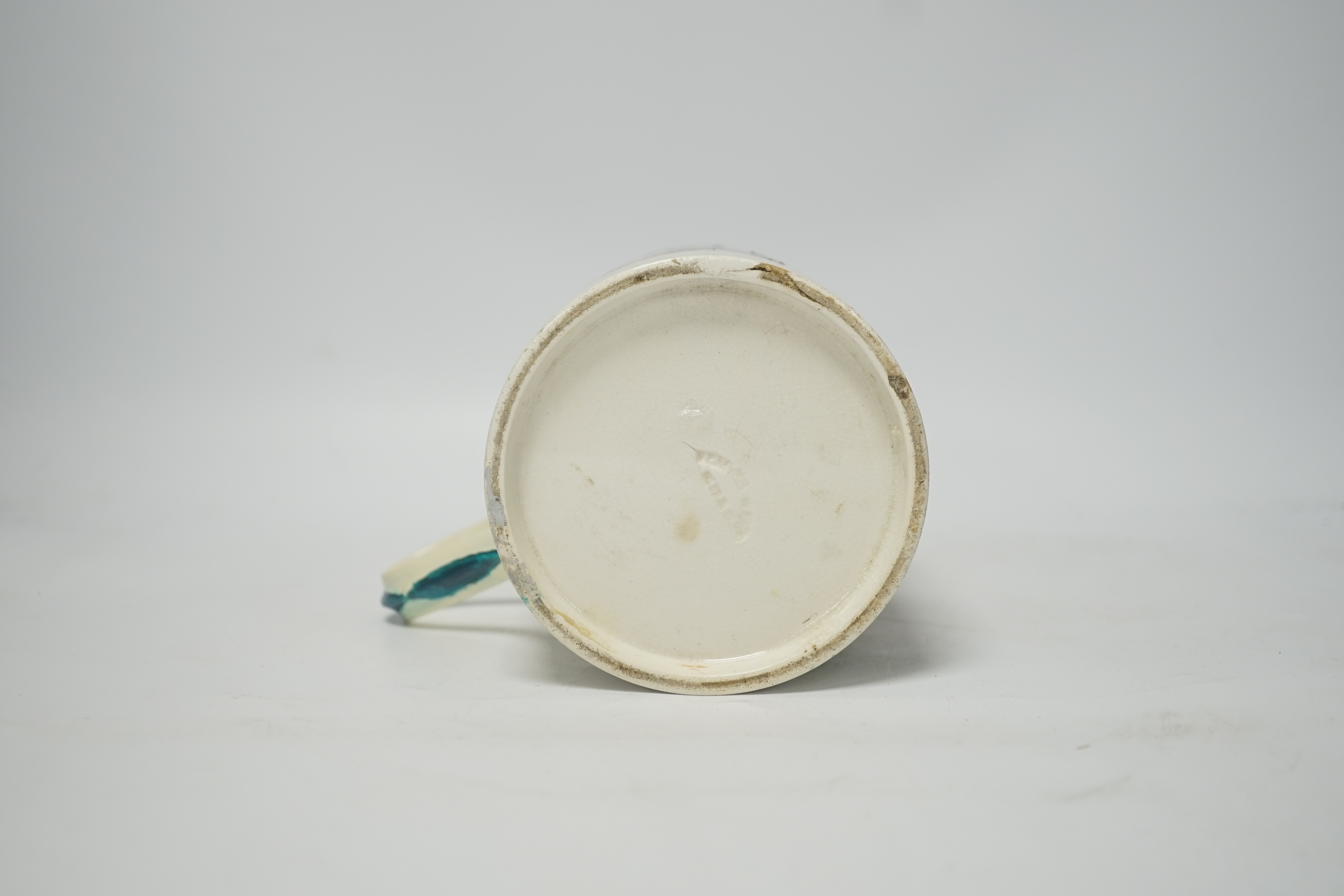 A Wemyss mug with cherry decoration (restored a.f.), 14cm high